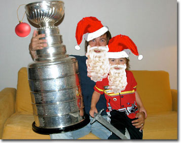 Santa and two of his helpers. One of them is over 100 years old.